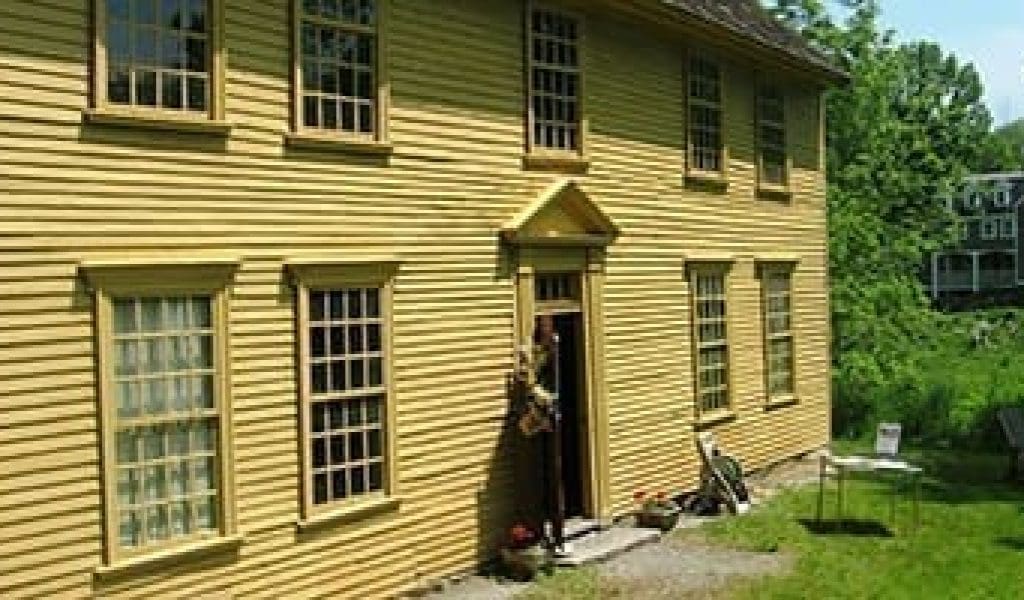 Exterior of Yellow Parson Barnard House in North Andover MA