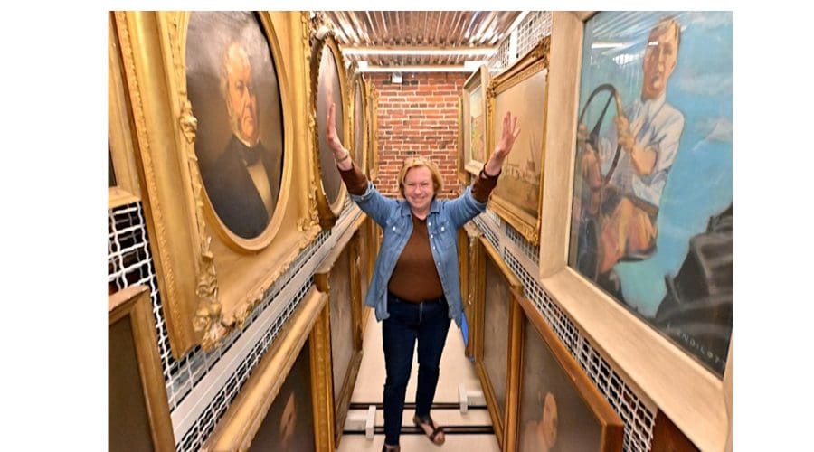 https://northofboston.org/wp-content/uploads/2025/08/Monica-and-Paintings.jpg