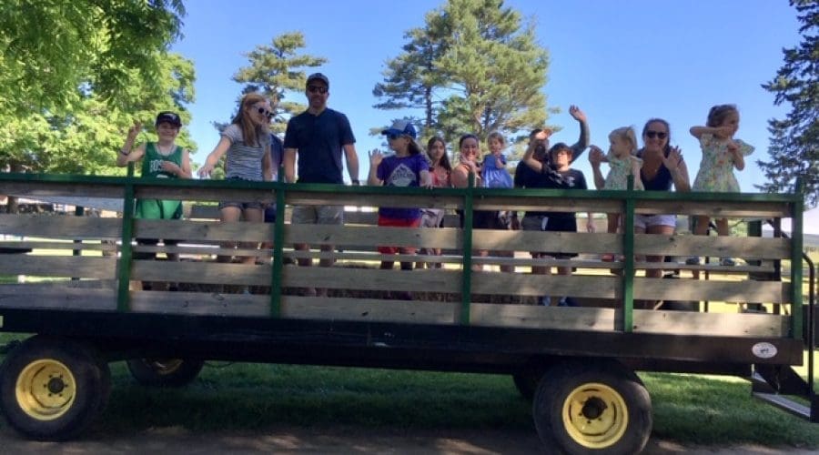 https://northofboston.org/wp-content/uploads/2026/05/Fathers-Day-BBQ-2024-hay-ride.jpg